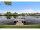 Private dock with bench overlooking the calm water at 4530 Flounder Dr, Hernando Beach, FL 34607