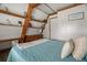 Upstairs bedroom with built-in shelves and a dresser at 4530 Flounder Dr, Hernando Beach, FL 34607