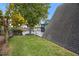 Landscaped backyard with a view of the canal at 4530 Flounder Dr, Hernando Beach, FL 34607