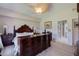 Spacious Primary bedroom with large dresser and water view at 6499 99Th N Way # 18B, St Petersburg, FL 33708