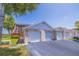 Condo building with attached garages and landscaping at 6499 99Th N Way # 18B, St Petersburg, FL 33708