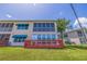 Ground level condo with a deck and screened-in patio at 6499 99Th N Way # 18B, St Petersburg, FL 33708