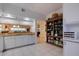White kitchen cabinets, granite countertops, and ample storage at 6499 99Th N Way # 18B, St Petersburg, FL 33708