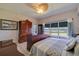 Bright bedroom with large window and water view at 6499 99Th N Way # 18B, St Petersburg, FL 33708