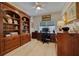 Spacious home office with built-in bookcases and desk at 6499 99Th N Way # 18B, St Petersburg, FL 33708