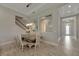 Elegant dining room features a modern table and chairs at 5608 Madrigal Way, Apollo Beach, FL 33572