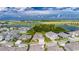 Aerial view showcasing a single-Gathering home's location within a community at 5608 Madrigal Way, Apollo Beach, FL 33572