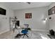 Home office with desk, chair, and neutral-toned walls at 5608 Madrigal Way, Apollo Beach, FL 33572