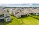 Aerial view of house and surrounding community at 5608 Madrigal Way, Apollo Beach, FL 33572