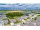 Aerial view of a new home community with lakes and lush landscaping at 5608 Madrigal Way, Apollo Beach, FL 33572