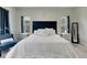 Main bedroom with a large bed and two nightstands at 5608 Madrigal Way, Apollo Beach, FL 33572