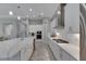Modern kitchen with white cabinets and quartz countertops at 5608 Madrigal Way, Apollo Beach, FL 33572