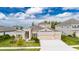 Attractive single-Gathering home with two-car garage and manicured lawn at 5608 Madrigal Way, Apollo Beach, FL 33572