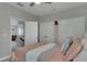 Bedroom with a double bed, access to a hallway, and double door closet at 5608 Madrigal Way, Apollo Beach, FL 33572