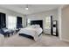 Main bedroom with a large bed, and two nightstands at 5608 Madrigal Way, Apollo Beach, FL 33572