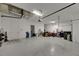 Garage interior with ample space for parking and storage at 5608 Madrigal Way, Apollo Beach, FL 33572