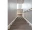 Modern stairs with gray laminate at 10911 Johanna Ave, Riverview, FL 33578