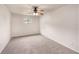 Bright bedroom with ceiling fan and carpet flooring at 16139 Villa Dr, Hudson, FL 34667