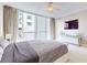 Spacious bedroom with king-size bed and city view at 450 Knights Run Ave # 702, Tampa, FL 33602