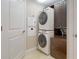 Convenient laundry room with stacked washer and dryer at 450 Knights Run Ave # 702, Tampa, FL 33602