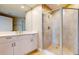 Bathroom boasts a large shower and modern vanity at 450 Knights Run Ave # 702, Tampa, FL 33602