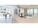 Modern kitchen with white cabinets and quartz countertops at 450 Knights Run Ave # 702, Tampa, FL 33602