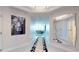 Bright hallway featuring stylish decor and views to living room at 450 Knights Run Ave # 702, Tampa, FL 33602