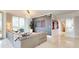 Modern living room with sectional sofa and accent wall at 450 Knights Run Ave # 702, Tampa, FL 33602