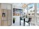 Breakfast nook with glass table and chairs, featuring city views at 450 Knights Run Ave # 702, Tampa, FL 33602
