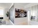 Elegant hallway with large artwork and mirror at 450 Knights Run Ave # 702, Tampa, FL 33602