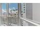 Stunning city view from large window, showcasing palm trees and modern buildings at 450 Knights Run Ave # 702, Tampa, FL 33602