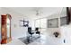 Bright home office with large windows and city view at 450 Knights Run Ave # 702, Tampa, FL 33602