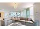 Spacious living room with sectional sofa and city views at 450 Knights Run Ave # 702, Tampa, FL 33602