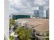 Aerial view of the community, showing its location near a stadium and other high-rise buildings at 450 Knights Run Ave # 702, Tampa, FL 33602