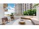 Community fire pit and seating area at 450 Knights Run Ave # 702, Tampa, FL 33602