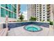 Relaxing hot tub with outdoor shower nearby at 450 Knights Run Ave # 702, Tampa, FL 33602