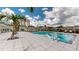 Inviting community pool with surrounding lounge chairs at 450 Knights Run Ave # 702, Tampa, FL 33602