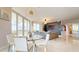 Elegant dining area with glass table and city views at 450 Knights Run Ave # 702, Tampa, FL 33602