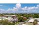 Sweeping balcony view, showcasing the surrounding neighborhood, tennis courts, and city skyline at 450 Knights Run Ave # 702, Tampa, FL 33602