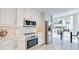 Modern kitchen with stainless steel appliances and white cabinets at 450 Knights Run Ave # 702, Tampa, FL 33602