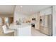 Modern kitchen featuring stainless steel appliances and white cabinets at 450 Knights Run Ave # 702, Tampa, FL 33602