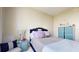 Light and airy bedroom with a bed and window seat at 450 Knights Run Ave # 702, Tampa, FL 33602