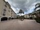 Community courtyard with fountain and parking at 501 Knights Run Ave # 1327, Tampa, FL 33602