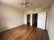 Bedroom with ceiling fan and spacious closet at 501 Knights Run Ave # 1327, Tampa, FL 33602