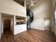Open living area with spiral staircase and high ceilings at 501 Knights Run Ave # 1327, Tampa, FL 33602