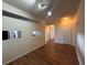 Living room with hardwood floors and high ceilings at 501 Knights Run Ave # 1327, Tampa, FL 33602