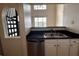 Kitchen with stainless steel dishwasher and granite counters at 501 Knights Run Ave # 1327, Tampa, FL 33602