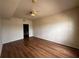 Bright bedroom with ceiling fan and access to a bathroom at 501 Knights Run Ave # 1327, Tampa, FL 33602