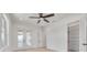 Bright bedroom with hardwood floors, double doors to balcony and large closet at 6012 Kipps Colony E Dr, Gulfport, FL 33707