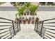 Modern stairway leading to the home's entrance at 6012 Kipps Colony E Dr, Gulfport, FL 33707